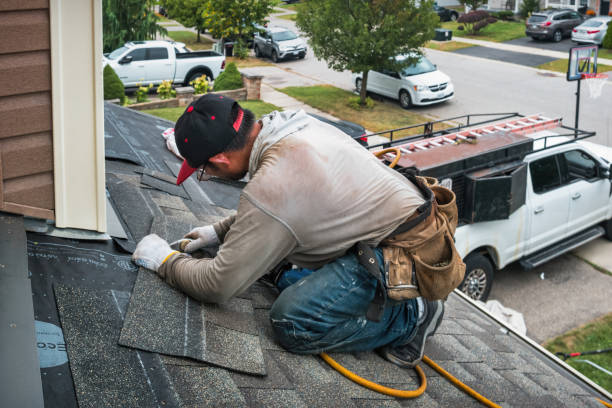 Professional Roof Replacement technician working in Hamilton, NY